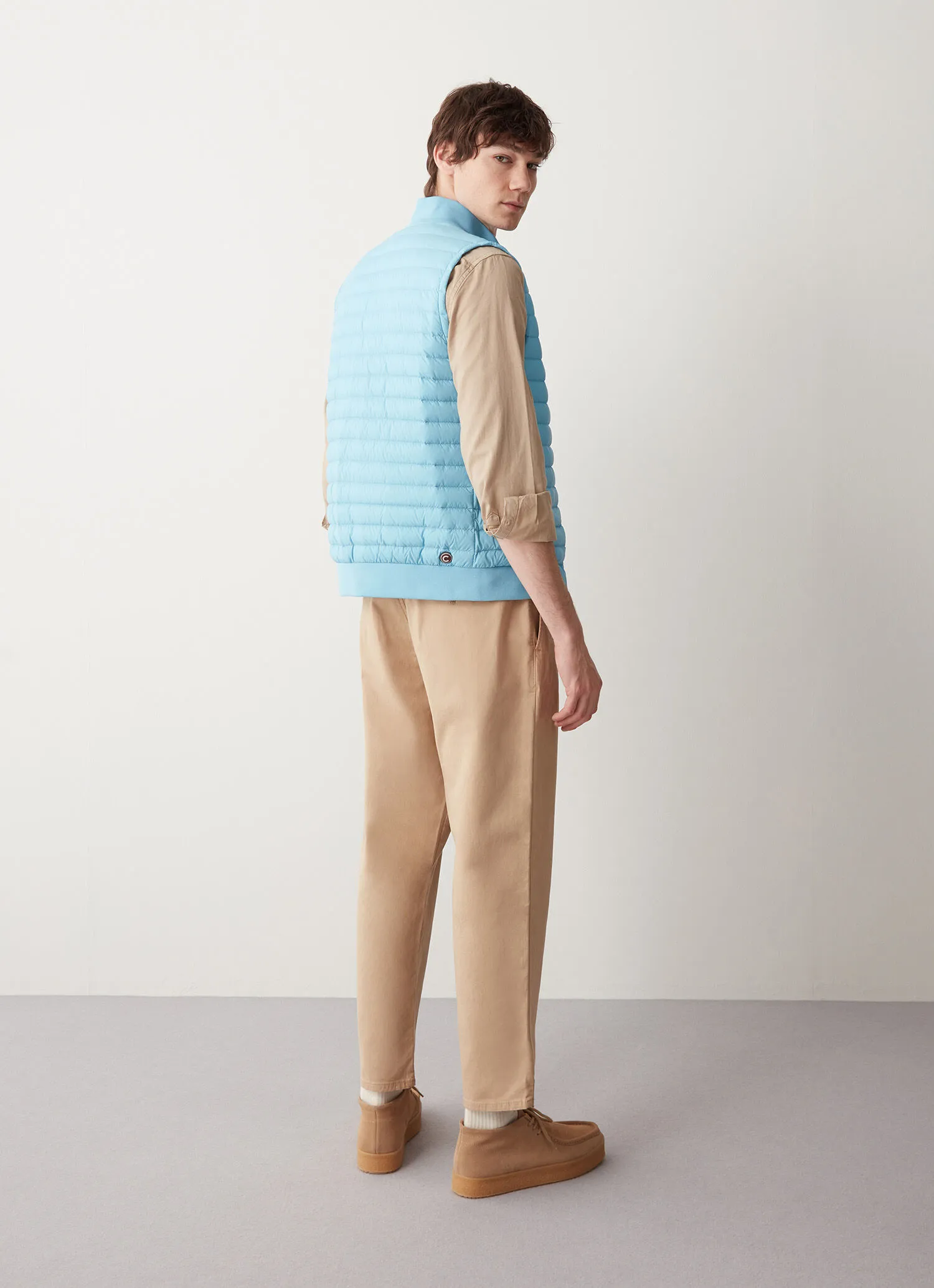 Down vest with knit details